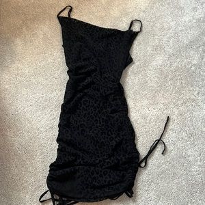size 4. black velvet cheetah print dress from hello molly